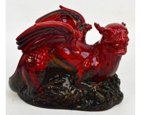 A Royal Doulton flambé veined figure of recumbent dragon, printed marks and impressed model number 2085 to base, signed PD, h