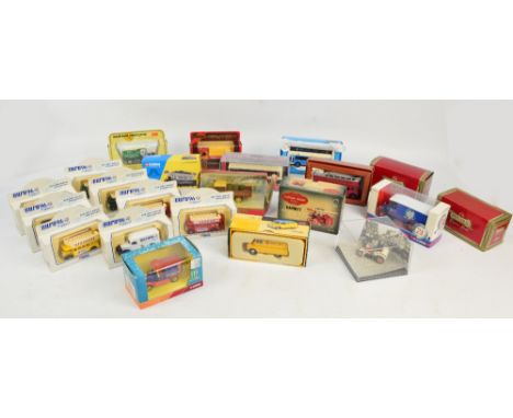 A collection of boxed diecast models of vehicles including Lledo Euro 96 Buses, Corgi Van, Corgi Showman's Tractor, Lledo 193