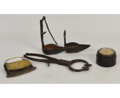A pair of Georgian sugar nips or cutters, a small circular timepiece, a brass mounted slightly curved tool, and a double sect