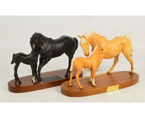 Two Beswick matt glazed figure groups of horses; model no.2466/2536 "Black Beauty and Foal" and model no.2689/2536 "Spirit of