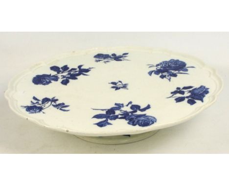 A Minton blue and white floral decorated lazy Susan with shaped spinning top and spreading circular foot, impressed marks, di