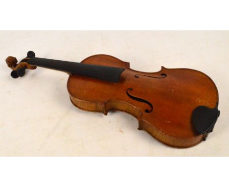 A three-quarter size German violin with two-piece back, Stradivarius copy, length of back 34.5cm.