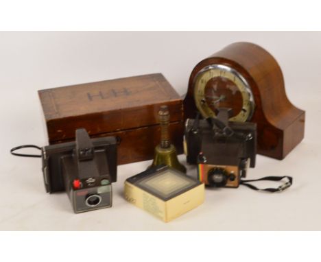 A late 19th century mahogany writing slope with inlaid initials, with sectioned pull out tray containing cigarette cards, top