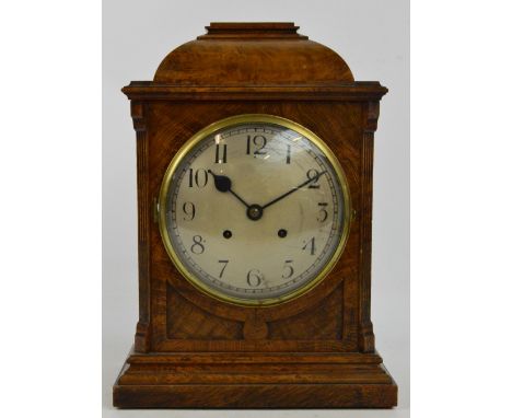 A 19th century pollard oak mantel clock, the circular silvered dial set with Arabic numerals housing a replaced eight day mov