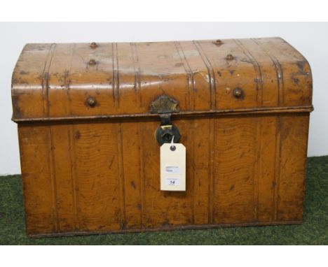 A vintage tin-trunk