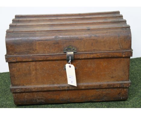 A vintage tin-trunk
