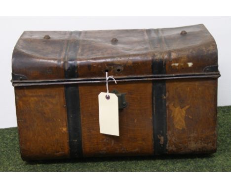 A vintage tin-trunk