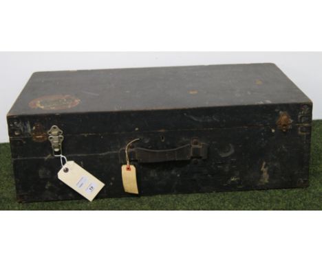 A painted-pine trunk with a 1940's shipping label