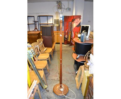 An oak standard-lamp