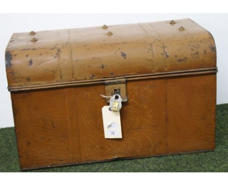 A vintage tin-trunk