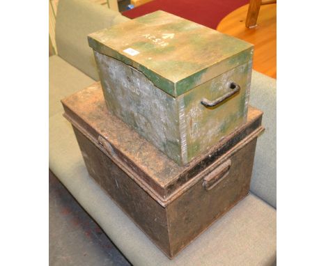 A wooden chest and a tin trunk