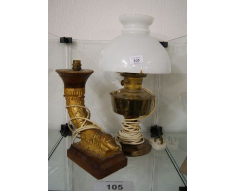 Brass oil lamp with shade and electric conversion, along with an unusual gilt table lamp base in the shape of a horn