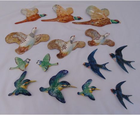 A quantity of ceramic wall mounted birds to include Beswick (14)