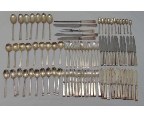 Mappin and Webb Art Deco design silver plated flatware to include knives, forks, spoons, fish eaters and a carving set