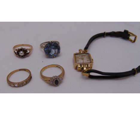 Four 9ct gold rings set with various stones and a Rotary 9ct gold ladies wristwatch