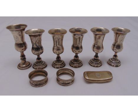 A quantity of hallmarked silver to include a snuff box, six Kiddush cups and two napkin rings, approx total weight 241g