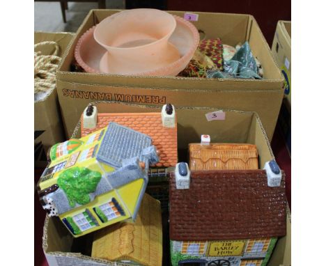 A box of books, a cloud glass centrepiece, a box of textiles and a box of china cottages