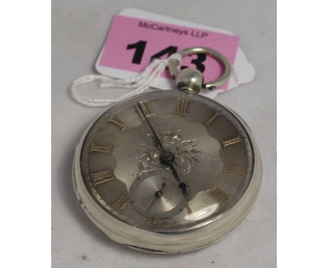 A silver key wind watch with engine turned dial and gilt Roman numerals. London 1899. C.R. Not running 