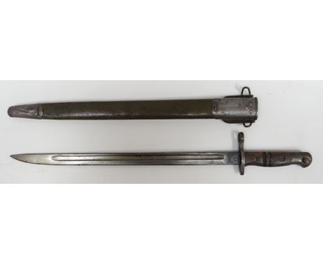 A British military 1913 Remington bayonet and scabbard with wooden handle, 22.5ins long (57cms)