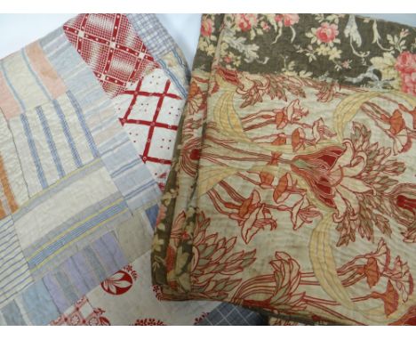 Two nineteenth century / early twentieth century patch-work quilts - a floral example, 92ins x 83ins (234 x 211cms) and a mul