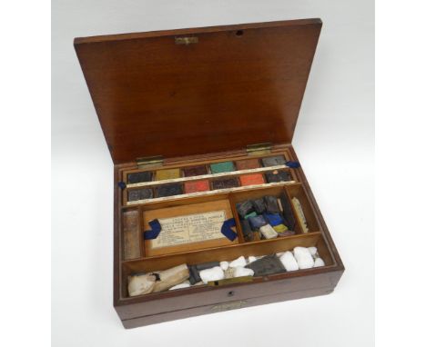 A late nineteenth century artist's paint-box by Reeves & Sons, containing numerous paint-blocks and the base drawer with Geor