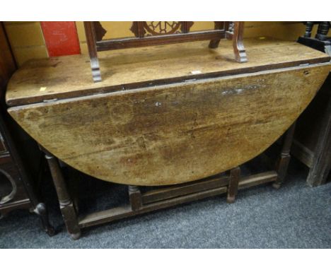 19TH CENTURY OAK OVAL GATE-LEG TABLE, 103cms diameter