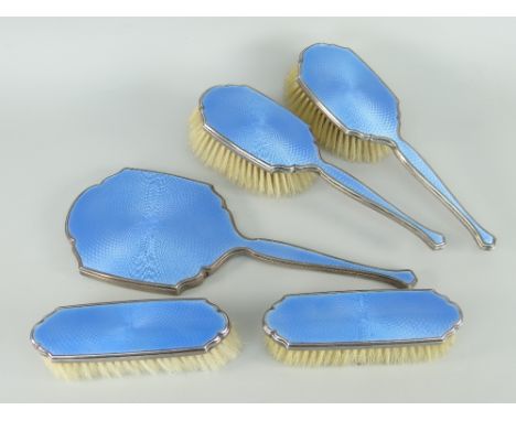 SILVER &amp; GUILLOCHE BLUE ENAMEL FIVE-PIECE VANITY SET comprising pair of hairbrushes, pair of clothes-brushes and mirror, 