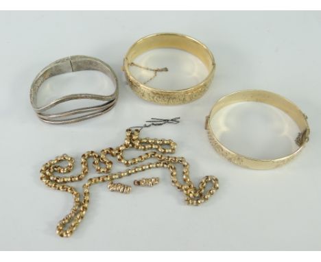 TWO GOLD PLATED SCROLL ENGRAVED BANGLES together with white metal bangle stamped 'Mexico 950', plated chain and links.