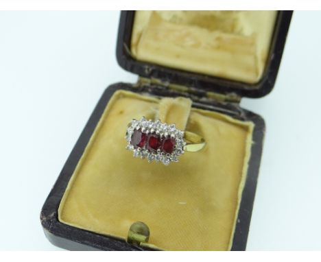 18CT YELLOW GOLD DIAMOND AND RUBY CLUSTER RING in Charles Fish Ltd jewellery box, 3.5gms.