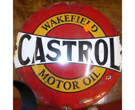 A convex enamel advertising sign for Wakefield Castrol motor oil, dia. 29cm
