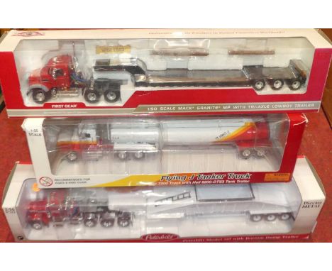 Three boxed First Gear and similar 1/50 scale construction and earth moving diecasts to include a Peterbilt 367 tractor unit 