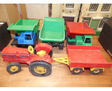 A quantity of German Big Bull plastic vehicles and earth moving diecast to include a Leyland tractor  