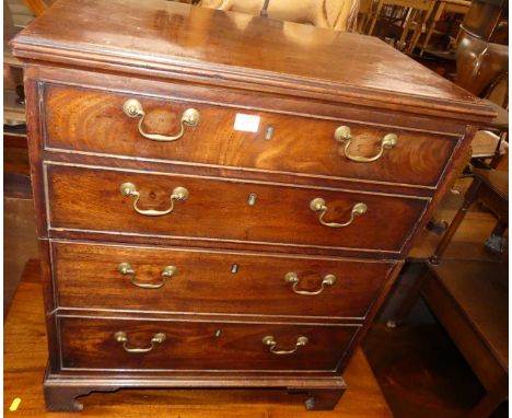A 19th century mahogany commode chest with hinged upper action, width 83cm
