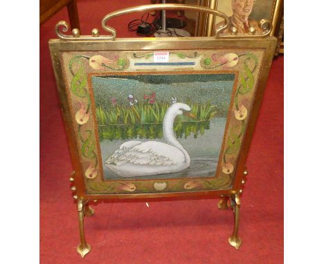 An Art Nouveau brass framed and hardstone inset fire screen decorated with a swan, width 51cmVery good condition with some ta
