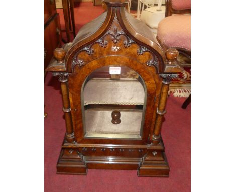 A mid Victorian figured walnut bracket clock case only, of ecclesiastical architectural form with glazed front and rear door 