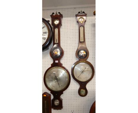 Two similar Regency mahogany four dial wheel barometers, the first signed W Martinelli, 2 King Street, the other Samuel Tyte,