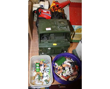 A mixed lot of children's toys to include an Action Man flatbed truck, a Tonka 4-wheel Jeep, and various plastic Britains Dee