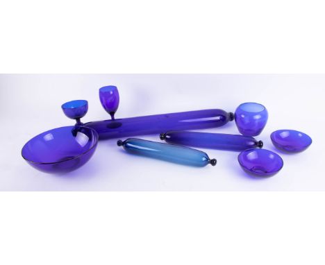 A large Victorian Bristol blue glass rolling pin, length 71cm, together with two other smaller models and a set of similar bl