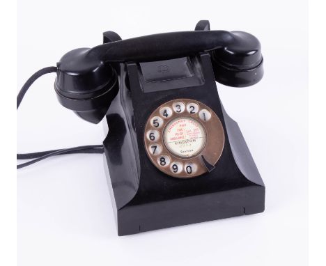 A vintage black telephone, AER.