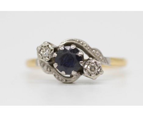 An 18ct sapphire and diamond set three stone ring, size O