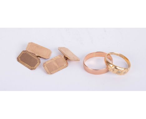 A pair of 9ct gold cufflinks (3.9g), a gold wedding band indistinct mark and 18ct gold ring (2g).