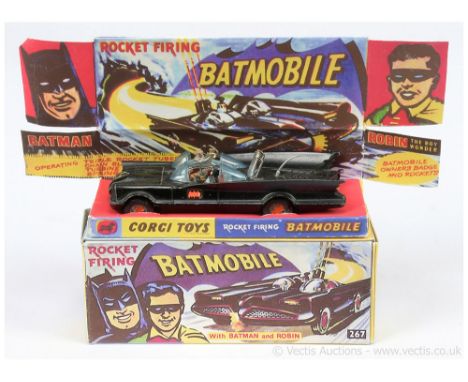 Corgi 267 "Batman" - Batmobile - finished in black, red bat hubs, blue tinted windows with "Batman and Robin" figures - model