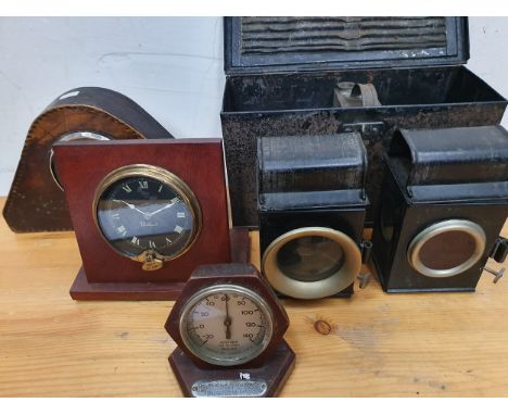 A Walford motorcar clock, a Smiths clock, a Rototherm gauge, together with a bicycle front and rear lamp, cased.
