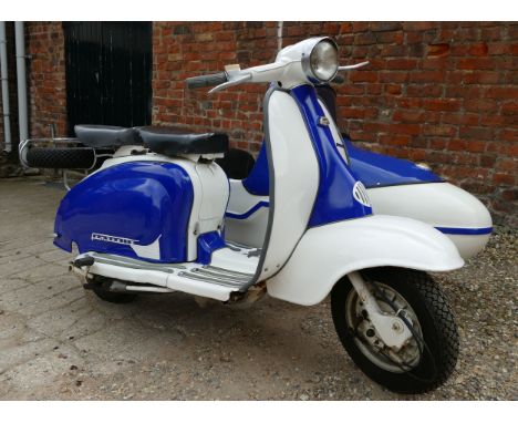 1959 Lambretta Series 2 Li150 with sidecar, 150 cc (see text). Registration number NVS 645 (non transferable). Frame number 1