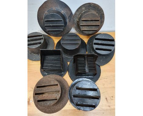 Nine various WWII period head lamp black out guards, (9).