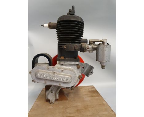 A vintage Hobart, Coventry engine, serial number M1068, mounted on a stand.