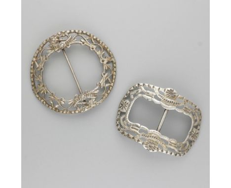 Round and rectangular model with molded decorations. Both bent. Netherlands, late 19th / early 20th century, hallmarks: vario