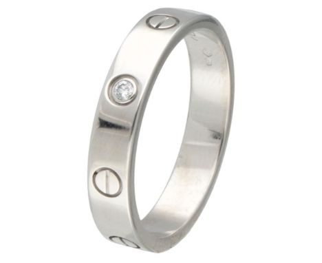 Hallmarks: © Cartier, 58, Au 750, PGI, St. Bernard dog head + B, scales 750. Serial number: HLL189. Set with one brilliant cu