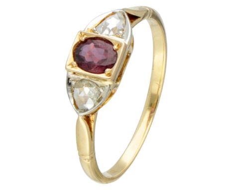 Hallmarks: 750. Set with 2 rose cut diamonds of approx. 3.6 x 2.8 mm in a white gold setting and an oval faceted synthetic ru
