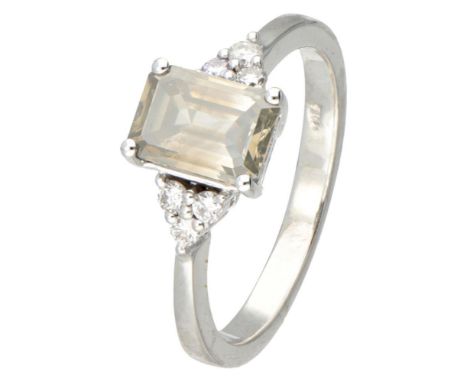 Hallmarks: 14KT. Set with one emerald cut diamond of approx. 1.06 ct. (SI2 / Light Grey) and 6 brilliant cut diamonds of appr